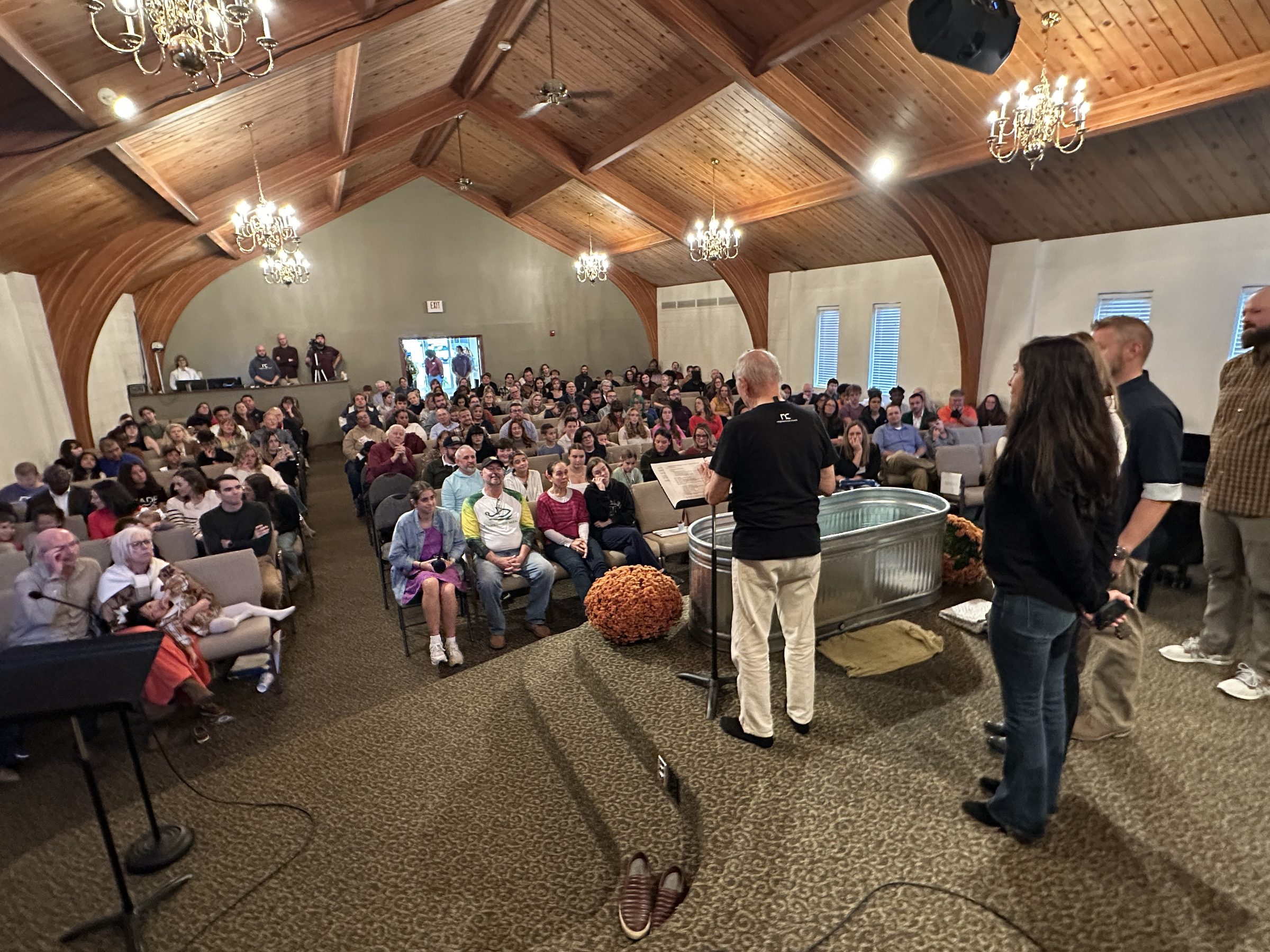 A full sanctuary gathered for Baptism Sunday at Neighborhood Church